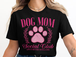 Black t-shirt with pink "Dog Mom Social Club" text and paw print design.
