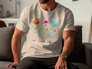 T-shirt with watercolor flowers, birds, dragonflies, and "Summer Vibes" text.