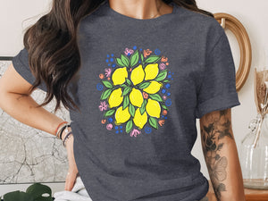 Dark grey t-shirt with a colorful lemon and flower illustration.