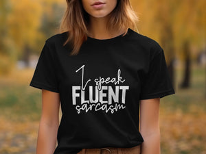Black t-shirt with white text "I speak FLUENT sarcasm"