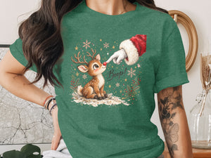 Santa's finger boops a reindeer's red nose amidst snowflakes and stars.