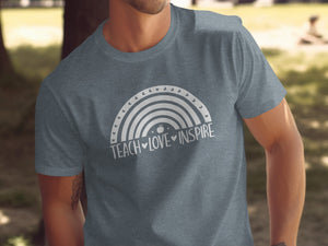 Gray t-shirt with white rainbow graphic and text "Teach Love Inspire".