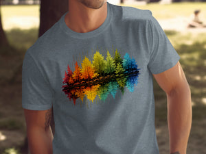 Grey t-shirt with a colorful abstract forest reflection graphic.