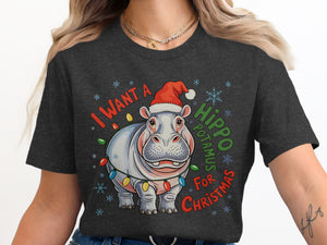 Hippo wearing Santa hat and Christmas lights, text "I want a hippopotamus for Christmas."