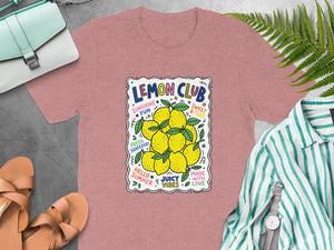 Pink t-shirt with a "Lemon Club" graphic featuring lemons and summer-themed text.