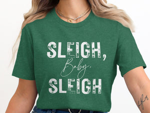 Green t-shirt with white text reading "SLEIGH, Baby, SLEIGH".