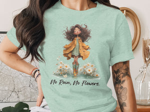 Mint t-shirt with illustration of girl in yellow coat and boots among flowers and text "No Rain, No Flowers."