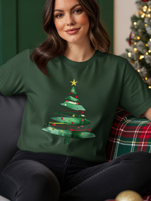 Green t-shirt with a watercolor Christmas tree graphic featuring red and yellow ornaments.