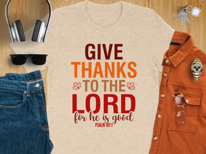 Light beige t-shirt with "GIVE THANKS TO THE LORD for he is good" text.