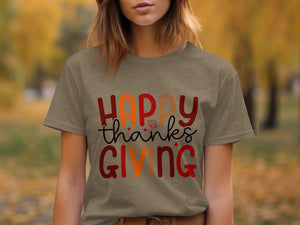 Brown t-shirt with "Happy Thanksgiving" text and fall leaf graphic.