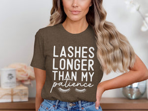 Brown t-shirt with white text: "Lashes Longer Than My Patience" and eyelashes.