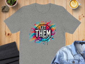 Grey t-shirt with "LET THEM" text and colorful abstract design.