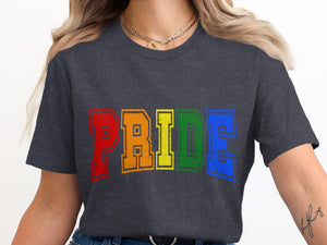 Dark gray t-shirt with "PRIDE" in rainbow varsity letters.