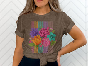 Brown t-shirt with a colorful floral bouquet design and striped background.
