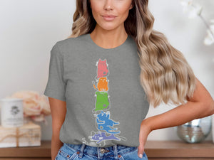 Grey t-shirt with a stack of colorful cats and yarn ball graphic.