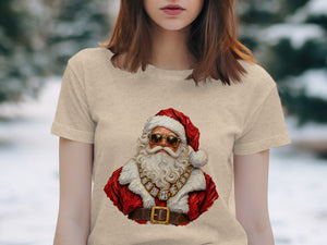 Santa Claus wearing sunglasses and a diamond necklace on a beige t-shirt.