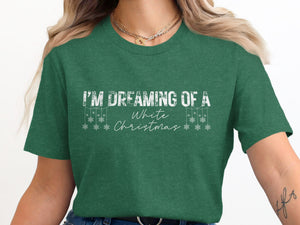 Green t-shirt with white text "I'M DREAMING OF A White Christmas" and snowflakes.