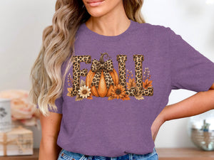 Purple t-shirt with leopard print "FALL" text and pumpkin graphic.