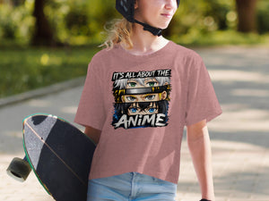 Pink t-shirt with anime eyes graphic and text "IT'S ALL ABOUT THE ANIME".