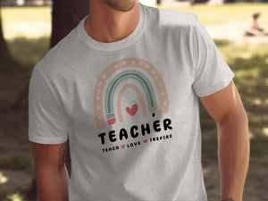 Light gray t-shirt with rainbow, pencil, heart, and "TEACHER" text.