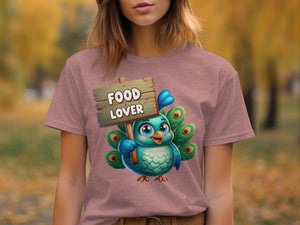 Turquoise cartoon peacock with peacock feathers holding a sign that says "Food Lover".