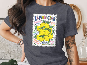 T-shirt graphic with "Lemon Club" text and cluster of vibrant yellow lemons.