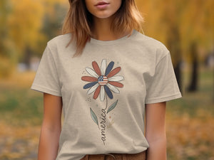 T-shirt with daisy design featuring American flag colors and text "america."