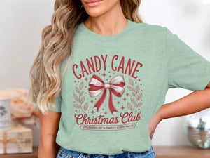 Light green t-shirt with red Candy Cane Christmas Club graphic and bow.