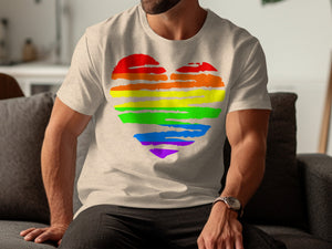 Light tan t-shirt with a rainbow heart graphic on the chest.
