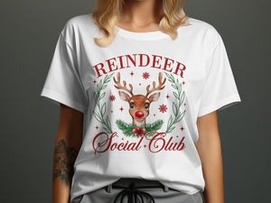 White t-shirt with reindeer graphic and text "REINDEER Social Club".