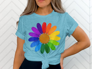 Light blue t-shirt with a colorful daisy graphic on the front.