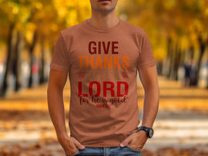 Orange t-shirt with text "GIVE THANKS TO THE LORD for he is good PSALM 107:1"