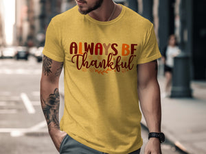 Yellow t-shirt with "ALWAYS BE Thankful" text and leaf graphics.