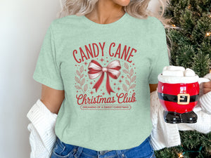 Mint green t-shirt with red text "Candy Cane Christmas Club Dreaming of a Sweet Christmas".