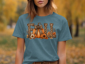 Teal t-shirt with leopard print "FALL" graphic featuring a pumpkin and autumn flowers.