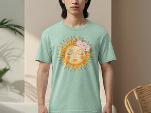 Mint green t-shirt with a sun face graphic adorned with pink flowers.