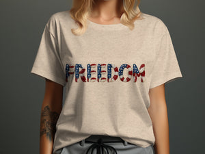 Light beige t-shirt with the word FREEDOM in American flag design.