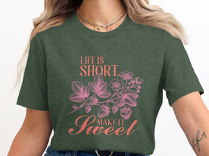 Green t-shirt with pink strawberries, flowers, and text "Life is short, Make it Sweet."