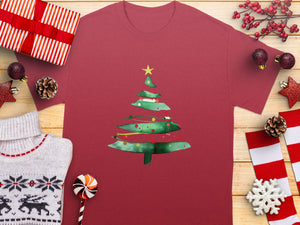 Maroon t-shirt with watercolor Christmas tree graphic and festive decorations.