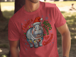T-shirt graphic of a hippo wearing a Santa hat with Christmas lights and text.