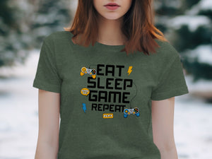 Text tee with "Eat Sleep Game Repeat" and gaming controller graphics.