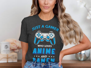 Dark t-shirt with blue text and graphics that reads "Just a gamer who loves anime and ramen".