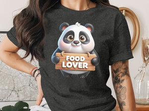 Panda holding wooden sign that says "FOOD LOVER" on a dark t-shirt.