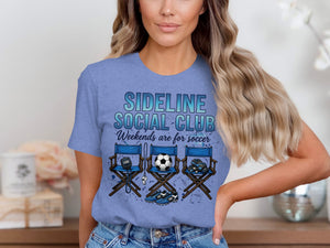 Blue t-shirt with "SIDELINE SOCIAL CLUB Weekends are for soccer" text and soccer gear.
