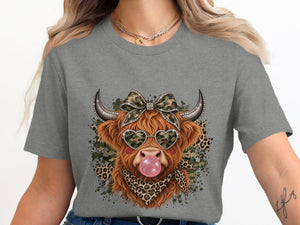Highland cow with heart sunglasses blowing bubblegum, wearing a camo bow and bandana.