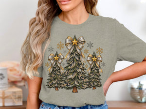 Three decorated leopard-print Christmas trees with gold bows and snowflakes on a gray t-shirt.