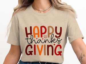 Light brown t-shirt with "Happy Thanksgiving" text and autumn leaf graphic.