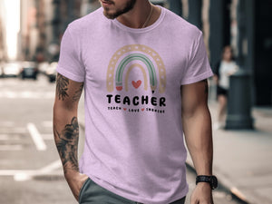 Light purple shirt with "TEACHER TEACH LOVE INSPIRE" text, rainbow, and hearts graphic.