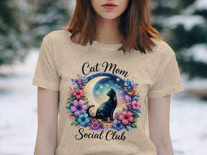 Black cat on moon surrounded by flowers and stars with text "Cat Mom Social Club."