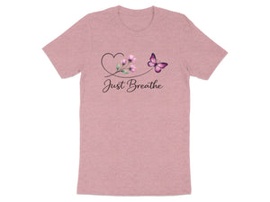 Pink t-shirt with a heart, flowers, butterfly, and "Just Breathe" text.